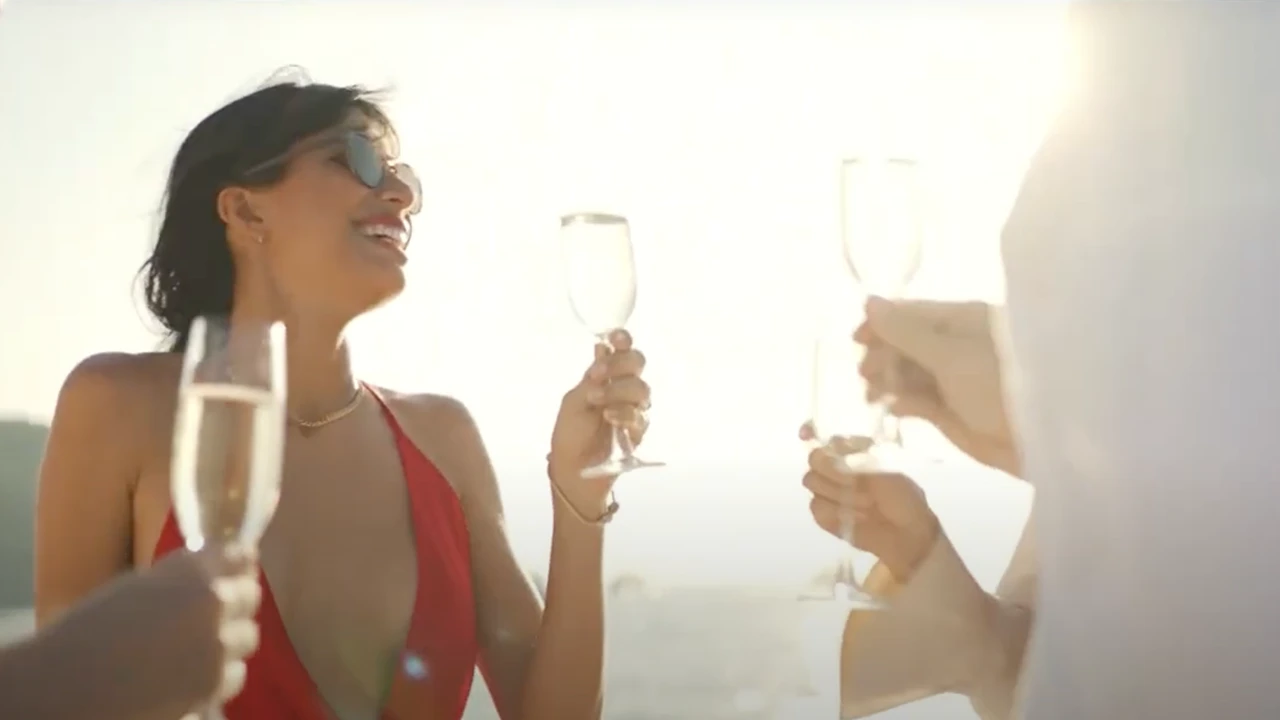 People toasting with champagne while enjoying the good life at Marina Pointe